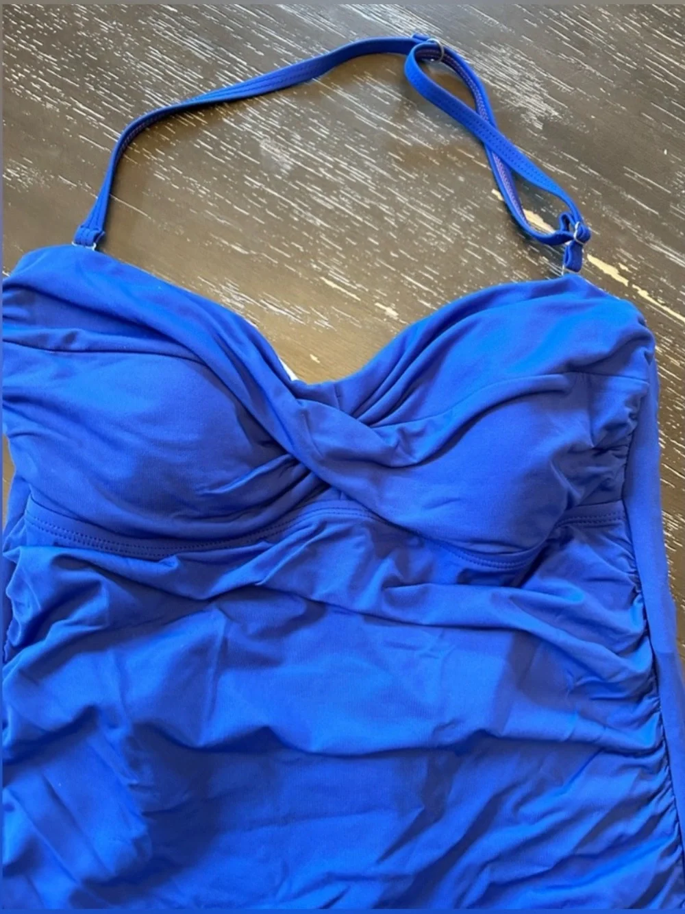 Beautiful blue one piece swimsuit.  Size 10. Very classy and cute!